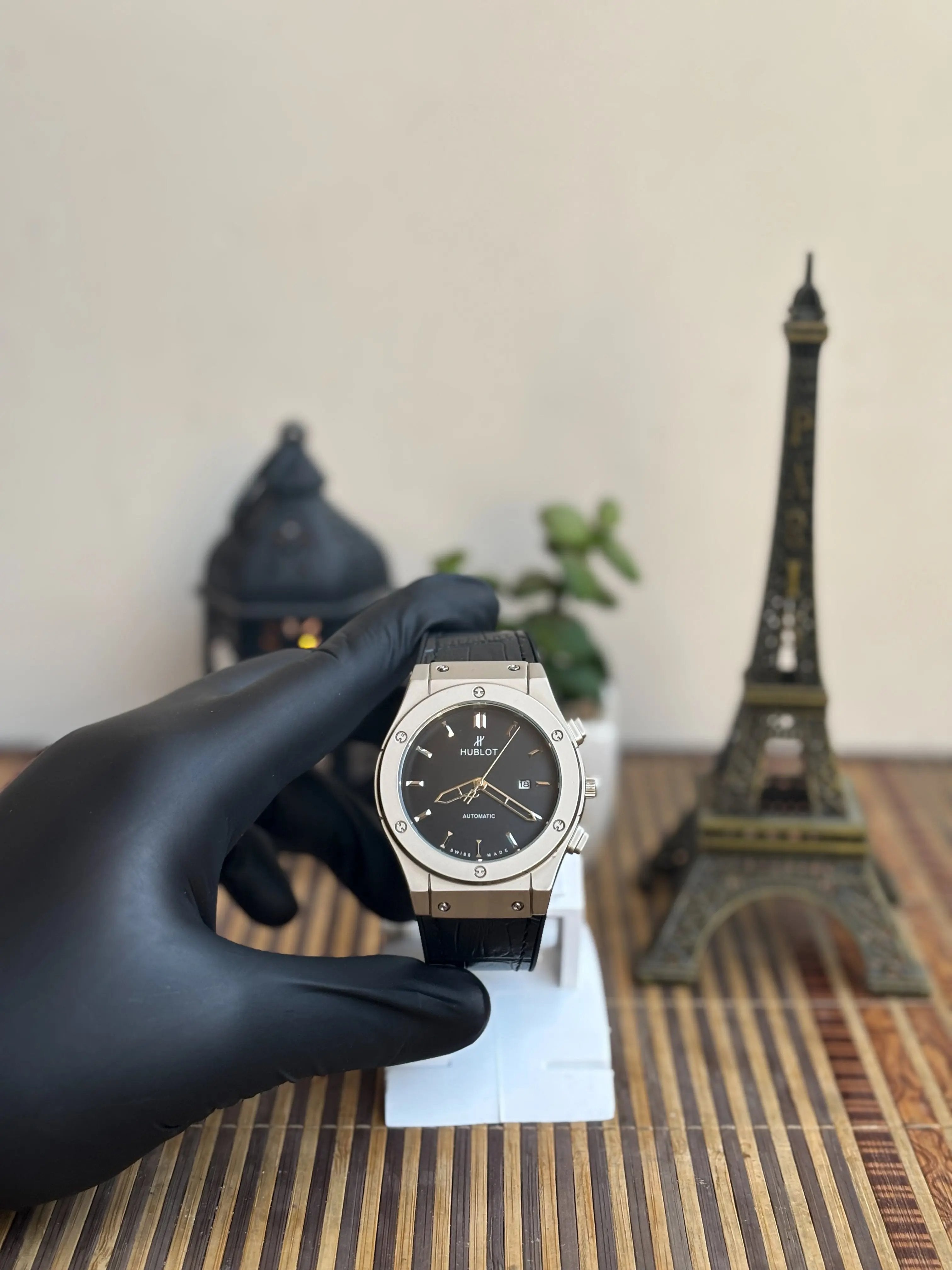 Classic fusion-style men’s watch with black dial, steel case and black leather strap